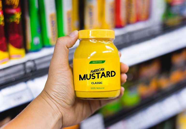 jar of yellow mustard