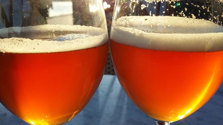 two glasses of wheat beer