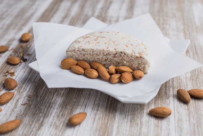 Almond cheese with almonds on the side
