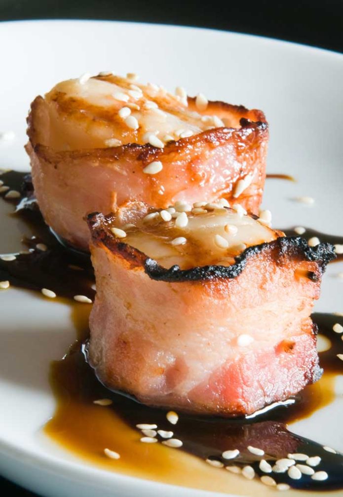 Bacon wrapped grilled Scallops with soy ginger reduction
