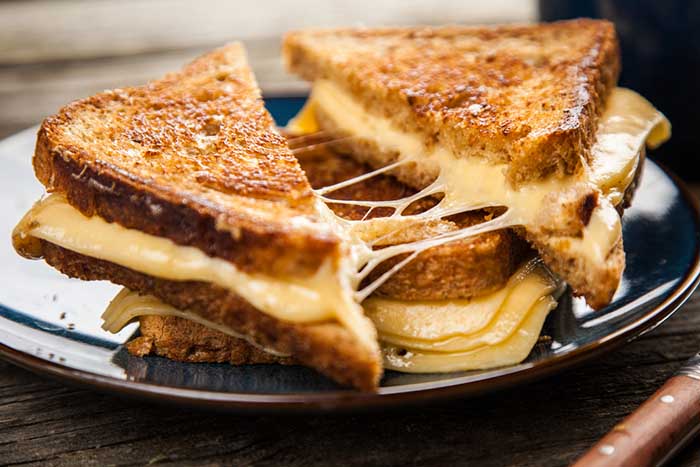 Grilled Chesse Sandwich in a black plate