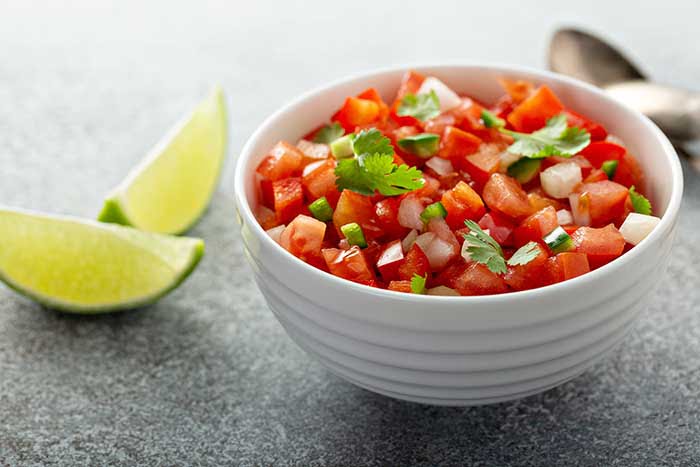 Homemade pico de gallo with tomatoes, peppers, jalapenos and red onions