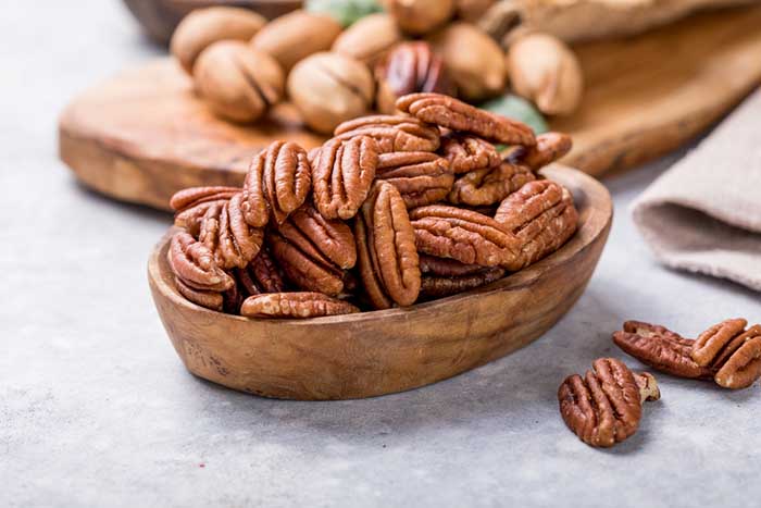 Pecans in a wooden bowl