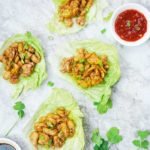 teriyaki chicken lettuce wraps on table with sweet chili sauce