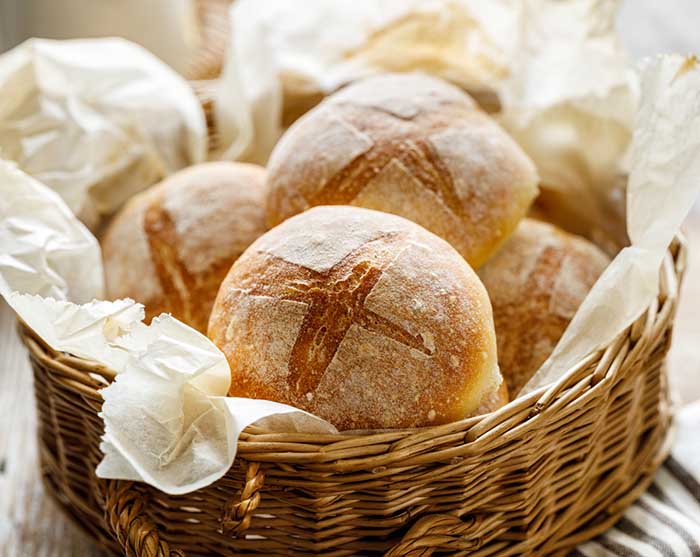 crusty bread rolls in a basket