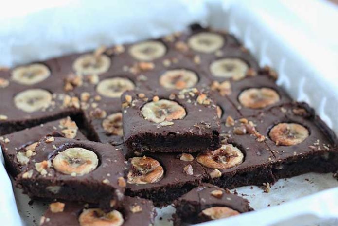 fresh vegan chocolate brownie with banana and almond