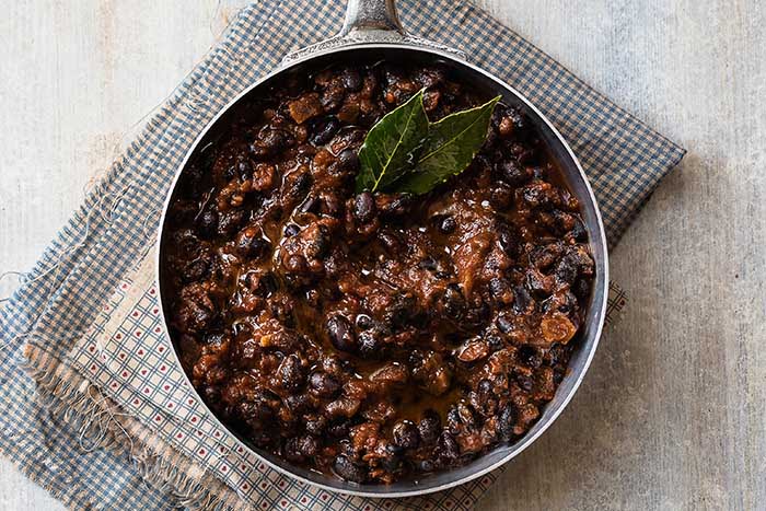 baked bean stew with fresh bay leaves