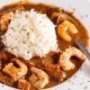 seafood gumbo served with white rice and shrimp