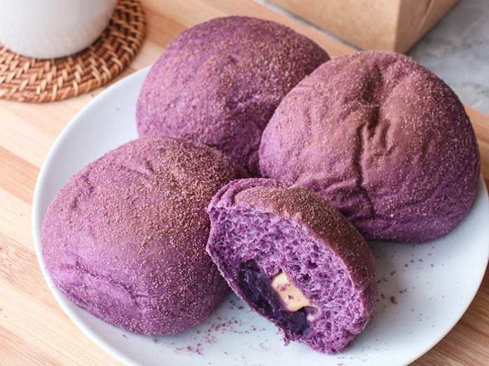 A homemade Ube bread with yam and cheese filling