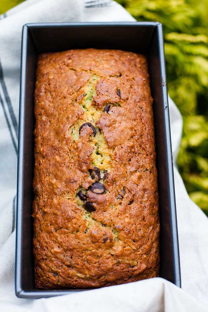 freshly baked courgette zucchini bread in loaf pan